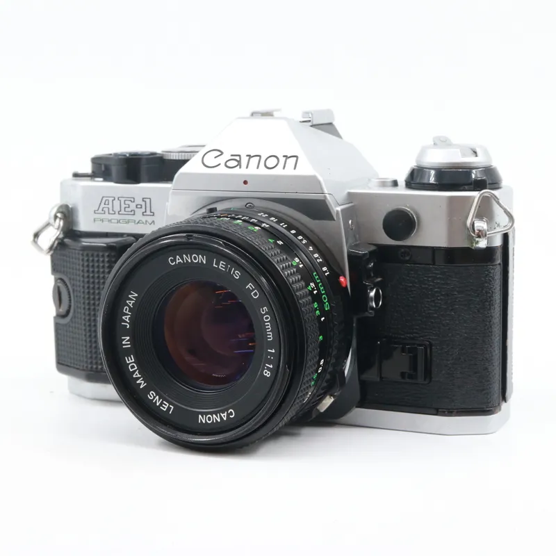Canon AE-1 Program zilver + FD 50mm f/1.8 occasion - tweedehands (occasion) — outlet/retourdeal